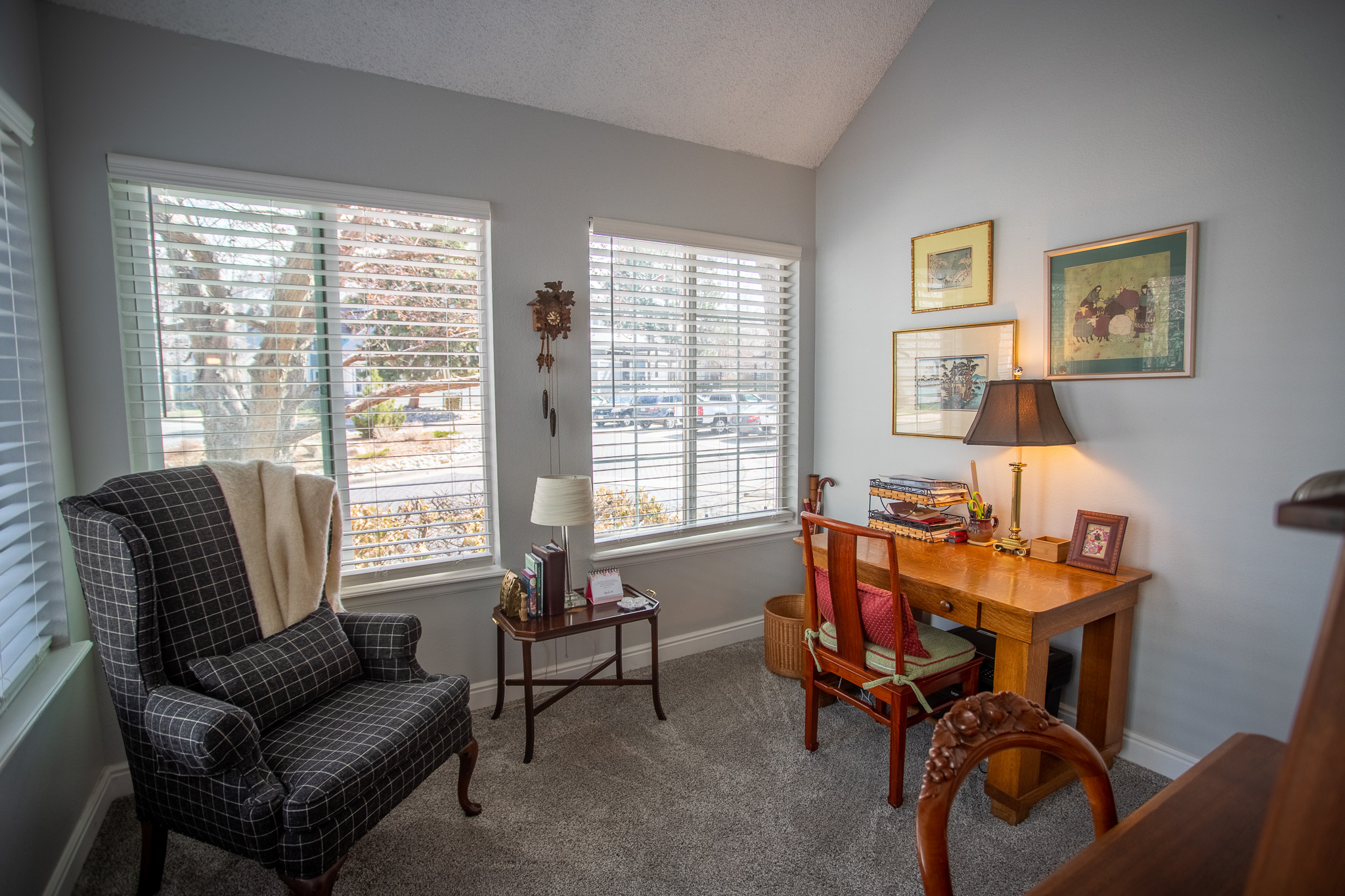 Reading chair near windows in a bedroom